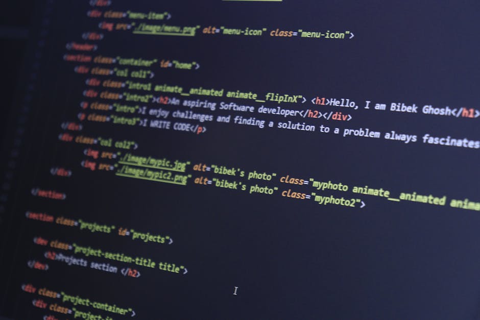A close-up of a computer screen displaying lines of HTML code with syntax highlighting in various colors, including blue, yellow, red, and green. The code appears to be part of a website's source file